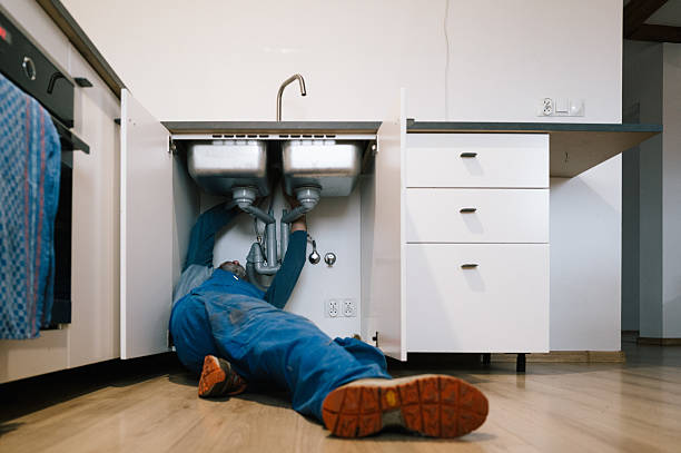 Professional Drain Cleaning technician working in Rescue, VA